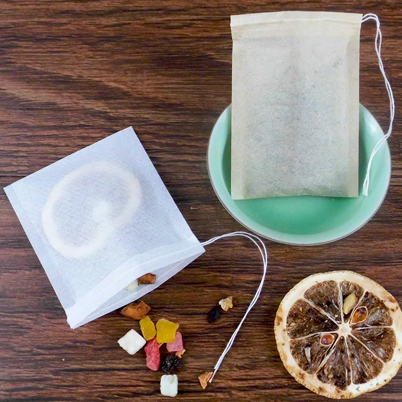 100 Eldobható filter Szűrő String Élelmiszer Minőségű Szövet Üres Teafiltert Környezetbarát, biológiailag Lebomló Papír teafilter Összehúzható